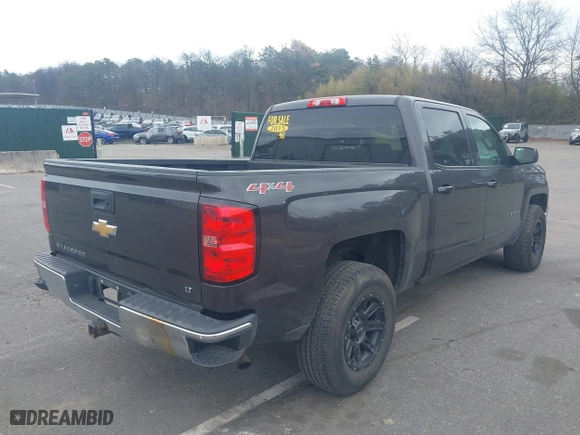 2015 Chevrolet Silverado 1500 LT with VIN 3GCUKREC9FG519510, listed as a IAAI auction lot 42026865 with 119,510 mi miles. Bid and sale history available at carsss.com. Image 4.