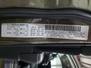 2015 Jeep Cherokee Latitude z VIN 1C4PJMCS9FW551890, wystawiony jako Copart lot #60148795 z przebiegiem 129 928 mil mil oraz Szkoda całkowita • Salvage title. Historia ofert i sprzedaży dostępna na DreamBid. Obrazek 13.