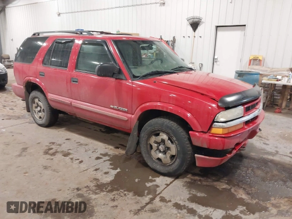 2004 Chevrolet Blazer LS z VIN 1GNDT13X34K157353, wystawiony jako IAAI lot #41089017 z przebiegiem 104 539 mil mil oraz . Historia ofert i sprzedaży dostępna na DreamBid. Obrazek 1.