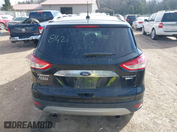 2016 Ford Escape Titanium with VIN 1FMCU9JX4GUB38303, listed as a IAAI auction lot 41788421 with 138,511 mi miles and . Bid and sale history available at DreamBid. Image 17.