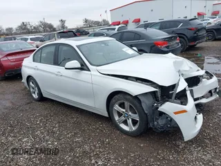 2014 BMW 3 Series 328i xDrive with VIN WBA3B5G50ENS06304, listed as a IAAI auction lot 41402704 with 139,943 mi miles. Bid and sale history available at carsss.com. Image 1.