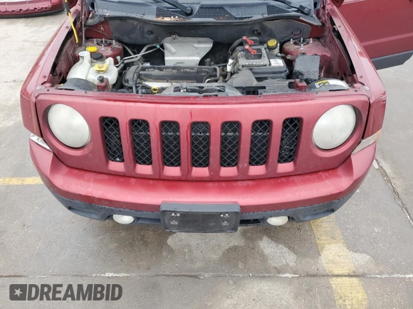 2014 Jeep Patriot Latitude with VIN 1C4NJPFA8ED818233, listed as a Copart auction lot 43947895 with 142,474 mi miles and Salvage Title. Bid and sale history available at carsss.com. Image 11.
