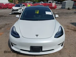 2021 Tesla Model 3 Standard Range Plus z VIN 5YJ3E1EA9MF027985, wystawiony jako IAAI lot #42045254 z przebiegiem 42 353 mil mil oraz . Historia ofert i sprzedaży dostępna na DreamBid. Obrazek 12.
