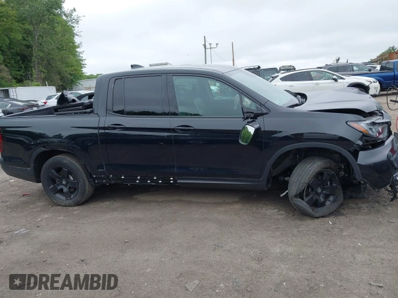 2024 Honda Ridgeline Black Edition with VIN 5FPYK3F83RB012452, listed as a IAAI auction lot 42422754 with 26,475 mi miles and . Bid and sale history available at DreamBid. Image 14.
