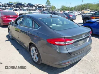2018 Ford Fusion Hybrid S with VIN 3FA6P0UU3JR122443, listed as a IAAI auction lot 41898129 with 119,873 mi miles. Bid and sale history available at carsss.com. Image 3.