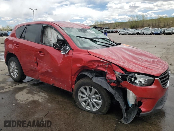 2016 Mazda CX-5 Touring with VIN JM3KE4CYXG0680266, listed as a Copart auction lot 55215755 with Not Provided miles and Non Repairable. Bid and sale history available at carsss.com. Image 4.