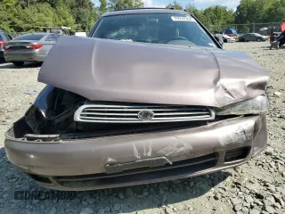 1995 Subaru Legacy L with VIN 4S3BK6353S7328522, listed as a Copart auction lot 71933944 with 60,105 mi miles and Salvage title. Bid and sale history available at DreamBid. Image 5.