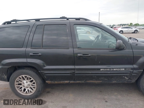 2004 Jeep Grand Cherokee Limited with VIN 1J4GW58N54C347896, listed as a IAAI auction lot 42350444 with 204,451 mi miles and . Bid and sale history available at DreamBid. Image 6.