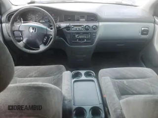 2002 Honda Odyssey EX z VIN 5FNRL18652B014929, wystawiony jako Copart lot #57185775 z przebiegiem 291 807 mil mil oraz Czysty tytuł • Clean title. Historia ofert i sprzedaży dostępna na DreamBid. Obrazek 8.