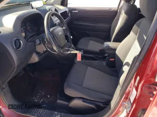 2010 Jeep Compass Sport with VIN 1J4NF4FB2AD525117, listed as a Copart auction lot 79426624 with 149,152 mi miles and Salvage Title. Bid and sale history available at carsss.com. Image 7.