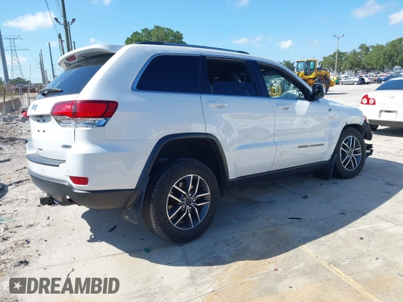2020 Jeep Grand Cherokee Laredo with VIN 1C4RJFAG5LC258309, listed as a IAAI auction lot 42573007 with 68,980 mi miles and . Bid and sale history available at DreamBid. Image 4.
