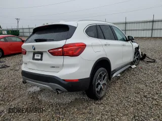 2019 BMW X1 sDrive28i with VIN WBXHU7C53K5L12037, listed as a Copart auction lot 65538082 with Not Provided miles. Bid and sale history available at carsss.com. Image 4.