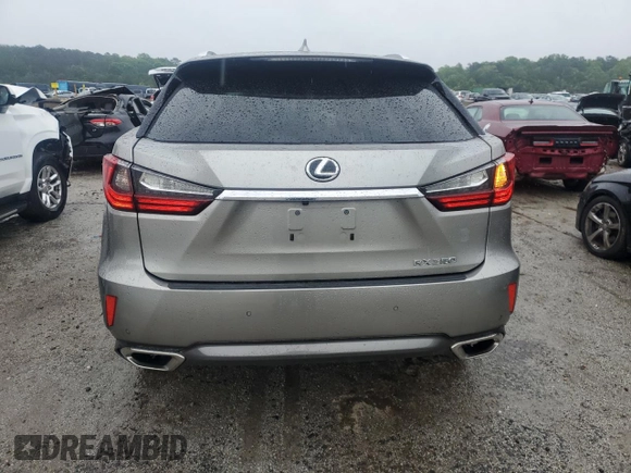 2017 Lexus RX 350 z VIN 2T2ZZMCA0HC072113, wystawiony jako Copart lot #55808185 z przebiegiem 99 900 mil mil oraz Czysty tytuł • Clean title. Historia ofert i sprzedaży dostępna na DreamBid. Obrazek 6.