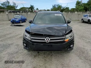 2014 Volkswagen Tiguan SE with VIN WVGAV3AXXEW543245, listed as a Copart auction lot 42288905 with 92,851 mi miles and Salvage title. Bid and sale history available at DreamBid. Image 14.