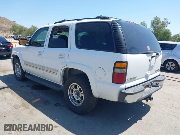 2004 Chevrolet Tahoe LS with VIN 1GNEC13T64R292075, listed as a IAAI auction lot 42138343 with 236,054 mi miles. Bid and sale history available at carsss.com. Image 3.