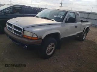 1997 Dodge Dakota z VIN 1B7GG23Y0VS242791, wystawiony jako Copart lot #71192374 z przebiegiem 181 769 mil mil oraz Czysty tytuł • Clean title. Historia ofert i sprzedaży dostępna na DreamBid. Obrazek 1.