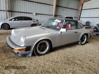 1988 Porsche 911 z VIN WP0EB0913JS161203, wystawiony jako Copart lot #71547754 z przebiegiem 109 128 mil mil oraz Szkoda całkowita • Salvage title. Historia ofert i sprzedaży dostępna na DreamBid. Obrazek 1.