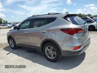2018 Hyundai Santa Fe 2.4L z VIN 5XYZU3LB2JG519430, wystawiony jako Copart lot #61460755 z przebiegiem 41 746 mil mil oraz Nie do naprawy • Non repairable. Historia ofert i sprzedaży dostępna na DreamBid. Obrazek 2.