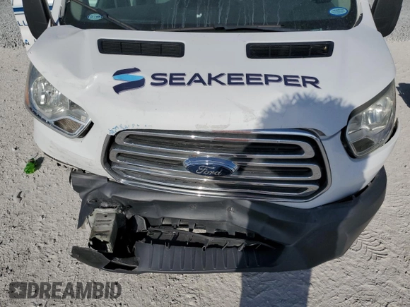 2016 Ford Transit Cargo z VIN 1FTYR1ZMXGKA70849, wystawiony jako Copart lot #50948045 z przebiegiem 93 945 mil mil oraz Szkoda całkowita • Salvage title. Historia ofert i sprzedaży dostępna na DreamBid. Obrazek 12.