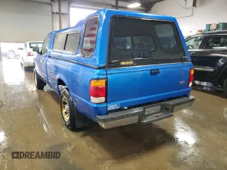 1999 Ford Ranger XLT with VIN 1FTYR10X0XUA52307, listed as a Copart auction lot 50044505 with 94,457 mi miles and Salvage title. Bid and sale history available at DreamBid. Image 2.