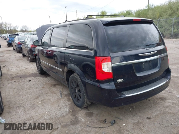 2011 Chrysler Town & Country Touring L with VIN 2A4RR8DG8BR645498, listed as a IAAI auction lot 42070744 with 173,661 mi miles and . Bid and sale history available at carsss.com. Image 3.
