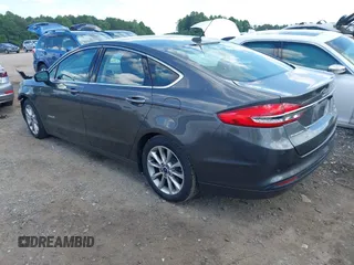 2017 Ford Fusion Hybrid SE z VIN 3FA6P0LU3HR260558, wystawiony jako IAAI lot #42657176 z przebiegiem 161 183 mil mil oraz . Historia ofert i sprzedaży dostępna na DreamBid. Obrazek 3.