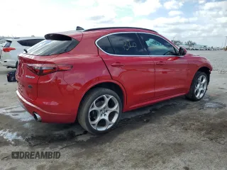 2023 Alfa Romeo Stelvio Ti z VIN ZASPAKBN2P7D65711, wystawiony jako Copart lot #55311535 z przebiegiem 32 906 mil mil oraz Nie do naprawy. Historia ofert i sprzedaży dostępna na DreamBid. Obrazek 3.