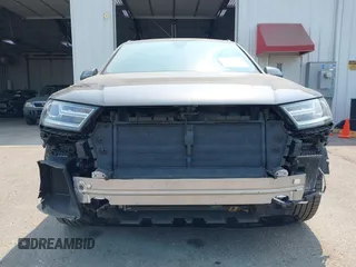 2019 Audi Q7 Premium with VIN WA1AAAF73KD031616, listed as a IAAI auction lot 39952592 with 60,839 mi miles and . Bid and sale history available at DreamBid. Image 6.