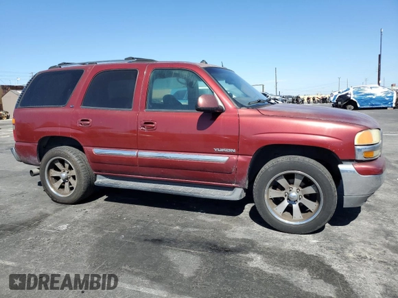 2003 GMC Yukon SLT z VIN 1GKEC13T53J319647, wystawiony jako Copart lot #49014225 z przebiegiem 298 601 mil mil oraz Czysty tytuł • Clean title. Historia ofert i sprzedaży dostępna na DreamBid. Obrazek 4.