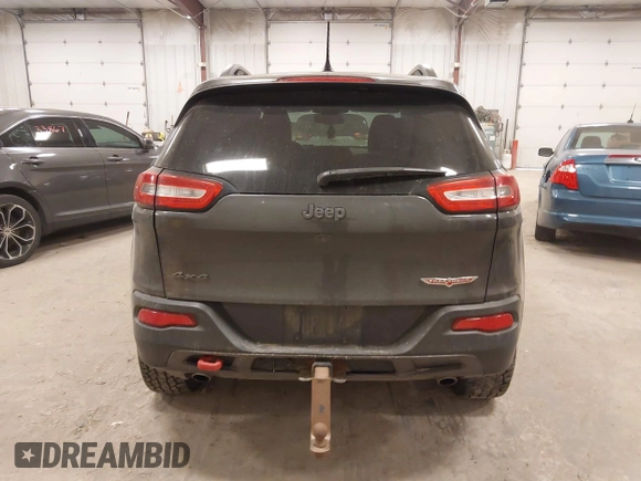 2015 Jeep Cherokee Trailhawk с VIN 1C4PJMBSXFW525218, выставлен на аукционе IAAI как лот 42032130 с пробегом 164 289 миль миль и . История ставок и продаж доступна на DreamBid. Изображение 16.