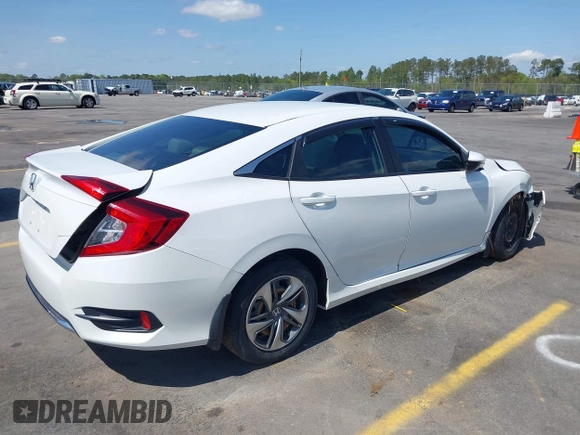 2020 Honda Civic LX with VIN 2HGFC2F61LH568767, listed as a IAAI auction lot 41909755 with 56,213 mi miles and . Bid and sale history available at DreamBid. Image 4.