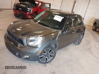 2011 MINI Countryman S z VIN WMWZC3C54BWL78942, wystawiony jako IAAI lot #42345296 z przebiegiem 158 202 mil mil oraz . Historia ofert i sprzedaży dostępna na DreamBid. Obrazek 2.
