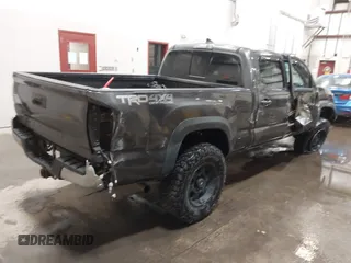 2017 Toyota Tacoma SR5 with VIN 3TMDZ5BN8HM016825, listed as a IAAI auction lot 41658400 with 166,098 mi miles. Bid and sale history available at carsss.com. Image 4.