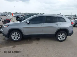 2016 Jeep Cherokee 75th Anniversary with VIN 1C4PJLCB1GW229823, listed as a IAAI auction lot 41848844 with 94,884 mi miles. Bid and sale history available at carsss.com. Image 14.