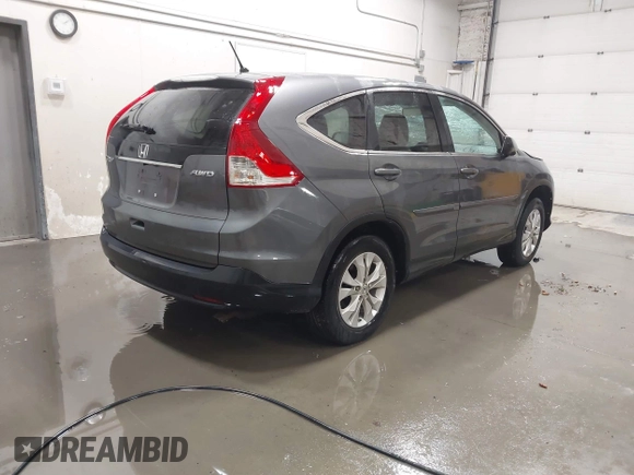 2013 Honda CR-V EX with VIN 2HKRM4H59DH682484, listed as a IAAI auction lot 41504589 with 208,260 mi miles and . Bid and sale history available at DreamBid. Image 4.