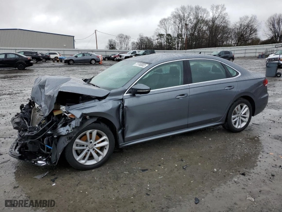 2020 Volkswagen Passat 2.0T SE with VIN 1VWSA7A33LC009038, listed as a Copart auction lot 71748002 with 68,701 mi miles. Bid and sale history available at carsss.com. Image 1.