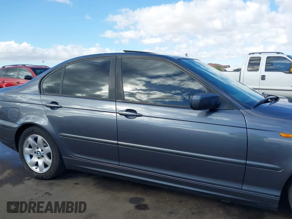 2002 BMW 3 Series 325i with VIN WBAET37482NG74460, listed as a IAAI auction lot 41712972 with 176,762 mi miles. Bid and sale history available at carsss.com. Image 13.
