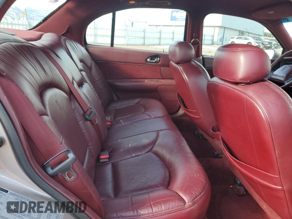 1995 Lincoln Continental with VIN 1LNLM97V4SY691749, listed as a Copart auction lot 41815915 with 69,582 mi miles and Salvage Title. Bid and sale history available at carsss.com. Image 10.