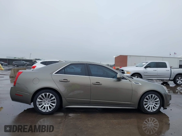 2010 Cadillac CTS with VIN 1G6DK5EG0A0137216, listed as a IAAI auction lot 41966117 with 177,686 mi miles and . Bid and sale history available at DreamBid. Image 13.