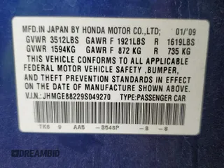 2009 Honda Fit with VIN JHMGE88229S049270, listed as a Copart auction lot 56935235 with 118,649 mi miles and Salvage title. Bid and sale history available at DreamBid. Image 12.