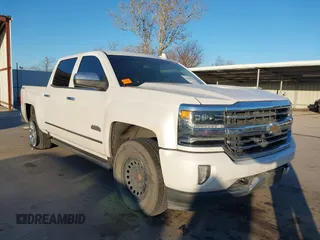 2018 Chevrolet Silverado 1500 High Country with VIN 3GCUKTEJ9JG131133, listed as a IAAI auction lot 41389559 with 221,788 mi miles and . Bid and sale history available at DreamBid. Image 1.