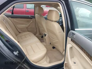 2005 Volkswagen Jetta 2.5L with VIN 3VWDF71K65M641809, listed as a IAAI auction lot 42230703 with 215,996 mi miles and . Bid and sale history available at DreamBid. Image 8.