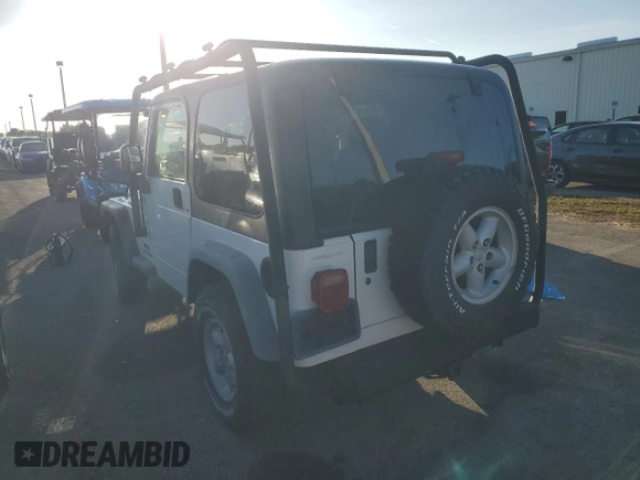 2006 Jeep Wrangler Sport Right Hand Drive with VIN 1J4F449SX6P733578, listed as a Copart auction lot 75113494 with 0 mi miles and Salvage Title. Bid and sale history available at carsss.com. Image 2.