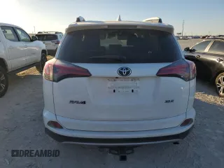 2018 Toyota RAV4 XLE with VIN JTMWFREV7JJ742974, listed as a Copart auction lot 41957735 with 87,005 mi miles and Salvage Title. Bid and sale history available at DreamBid. Image 6.
