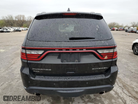 2014 Dodge Durango Citadel с VIN 1C4SDJET3EC592537, выставлен на аукционе Copart как лот 51525125 с пробегом 129 804 миль миль и Списание • Salvage title. История ставок и продаж доступна на DreamBid. Изображение 6.