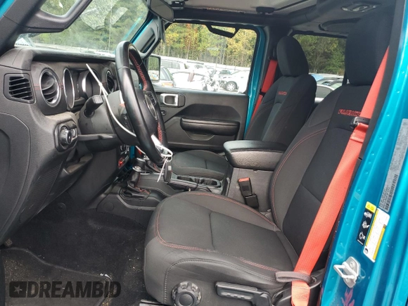 2020 Jeep Wrangler Unlimited Recon with VIN 1C4HJXFN5LW330617, listed as a Copart auction lot 73430514 with 52,827 mi miles and Salvage title. Bid and sale history available at DreamBid. Image 7.