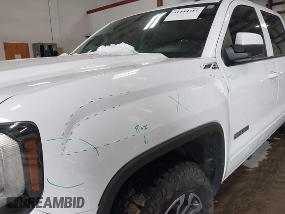 2017 GMC Sierra 1500 SLE z VIN 3GTU2MEC4HG374723, wystawiony jako IAAI lot #41400381 z przebiegiem 141 896 mil mil oraz . Historia ofert i sprzedaży dostępna na DreamBid. Obrazek 18.