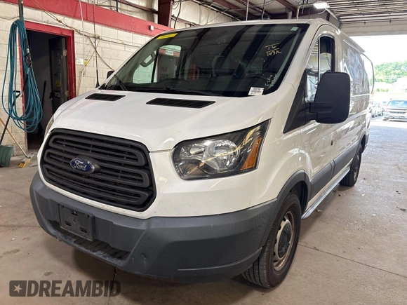 2016 Ford Transit Cargo z VIN 1FTYE1YM8GKB19172, wystawiony jako IAAI lot #42788511 z przebiegiem 143 978 mil mil oraz . Historia ofert i sprzedaży dostępna na DreamBid. Obrazek 31.