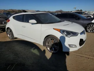2012 Hyundai Veloster w/Gray Int with VIN KMHTC6AD5CU054055, listed as a Copart auction lot 76632734 with 151,489 mi miles and Clean title. Bid and sale history available at DreamBid. Image 4.
