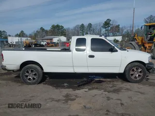 2000 Ford F-150 XL with VIN 1FTRX17LXYNC39983, listed as a IAAI auction lot 41750277 with 170,016 mi miles. Bid and sale history available at carsss.com. Image 13.